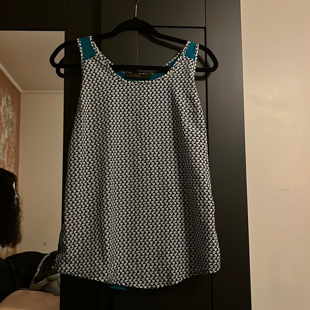 The limited blue and white blouse